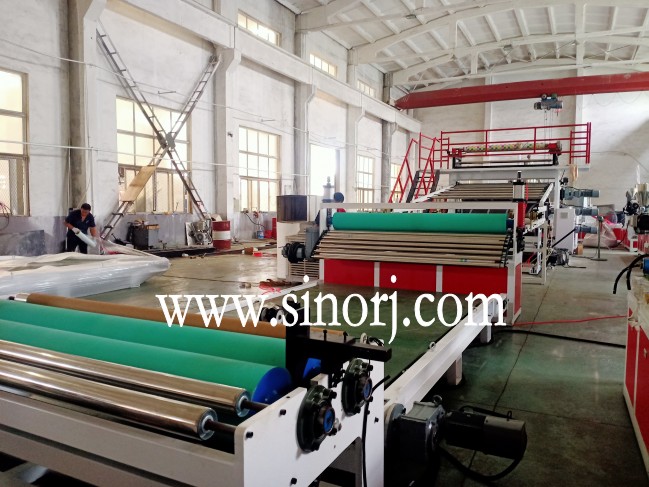 仿大理石板生產(chǎn)線，地板革生產(chǎn)線，三輥四輥集裝箱發(fā)貨中